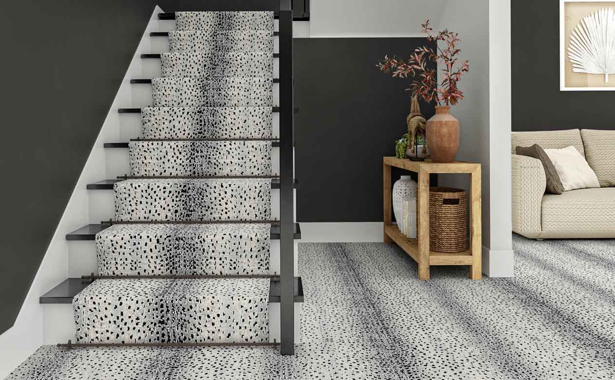 black and white animal printed carpet and stair runner